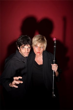 simsearch:400-05347613,k - Scary pagan couple in black with sceptre Stock Photo - Budget Royalty-Free & Subscription, Code: 400-05353803