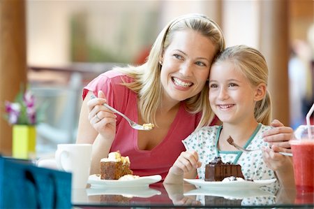 Mother And Daughter Having Lunch Together At The Mall Stock Photo - Budget Royalty-Free & Subscription, Code: 400-05364121