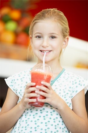 Young Girl Drinking A Berry Smoothie Stock Photo - Budget Royalty-Free & Subscription, Code: 400-05364131