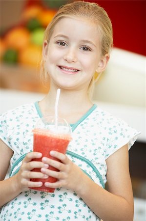 Young Girl Drinking A Berry Smoothie Stock Photo - Budget Royalty-Free & Subscription, Code: 400-05364132