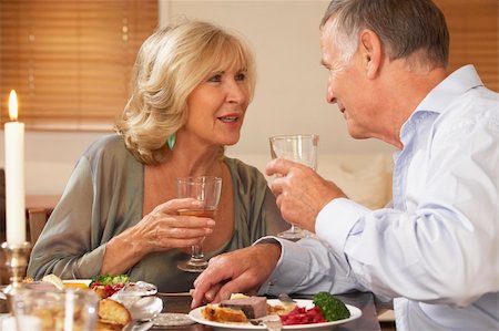 simsearch:400-05364195,k - Couple Enjoying A Meal At Home Together Stock Photo - Budget Royalty-Free & Subscription, Code: 400-05364227