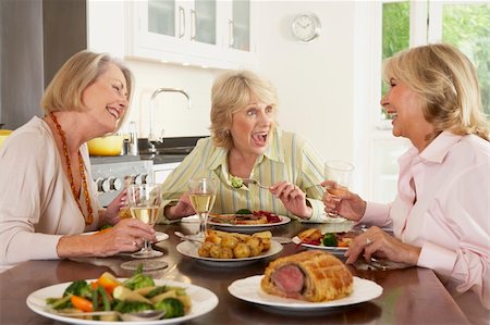 simsearch:400-04888522,k - Friends Enjoying Lunch At Home Together Stock Photo - Budget Royalty-Free & Subscription, Code: 400-05364234