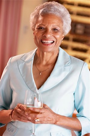 senior woman and wine and one person - Woman Having A Glass Of Wine At A Bar Stock Photo - Budget Royalty-Free & Subscription, Code: 400-05364246