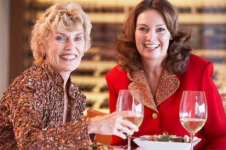 Friends Having Dinner Together At A Restaurant Stock Photo - Budget Royalty-Free & Subscription, Code: 400-05364268