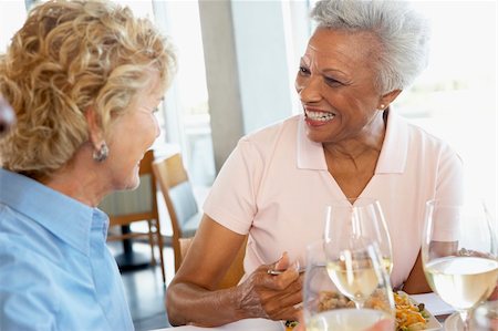 Friends Having Lunch Together At A Restaurant Stock Photo - Budget Royalty-Free & Subscription, Code: 400-05364279