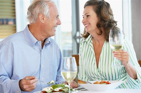 simsearch:400-05364195,k - Senior Couple Having Lunch Together At A Restaurant Stock Photo - Budget Royalty-Free & Subscription, Code: 400-05364291