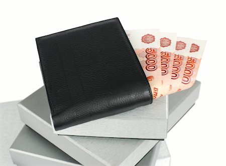 Wallet with Russian banknotes on silver gift boxes Stock Photo - Budget Royalty-Free & Subscription, Code: 400-05364351