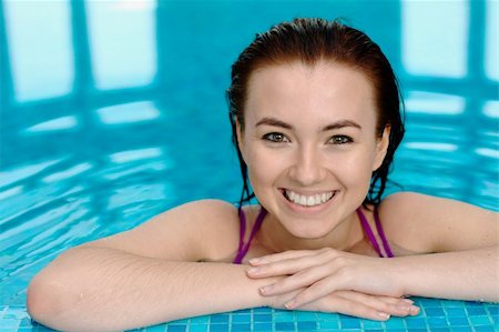 rosspetukhov (artist) - Close-up portrait of a smiling young beautiful girl at the swimming pool Photographie de stock - Aubaine LD & Abonnement, Code: 400-05364427