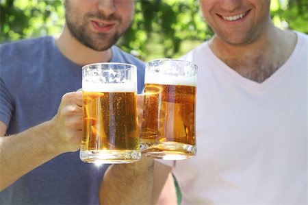 pub parties pic - Two men with glasses of the light beer in the garden Stock Photo - Budget Royalty-Free & Subscription, Code: 400-05365329