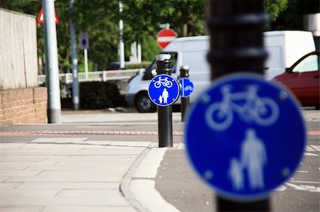 Bicycle lane with white mark of bicycle sign, London. Stockbilder - Microstock & Abonnement, Bildnummer: 400-05365430