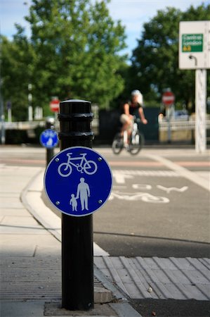 Bicycle lane with white mark of bicycle sign, London. Stockbilder - Microstock & Abonnement, Bildnummer: 400-05365432