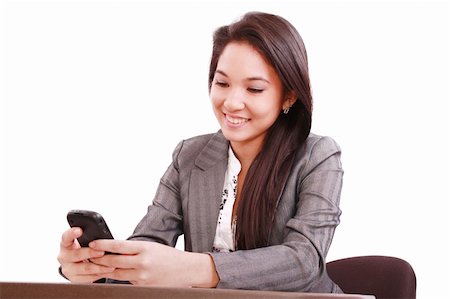 beautiful asian business woman using cellphone Stock Photo - Budget Royalty-Free & Subscription, Code: 400-05366544