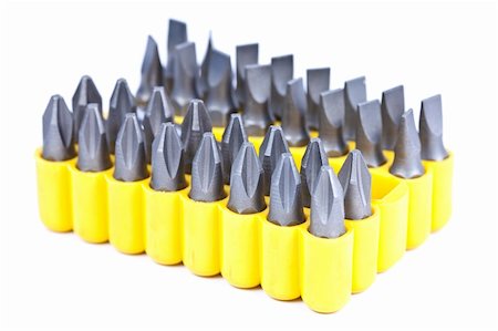 deymos (artist) - A set of screw tips in a yellow container isolated on white background Photographie de stock - Aubaine LD & Abonnement, Code: 400-05366975