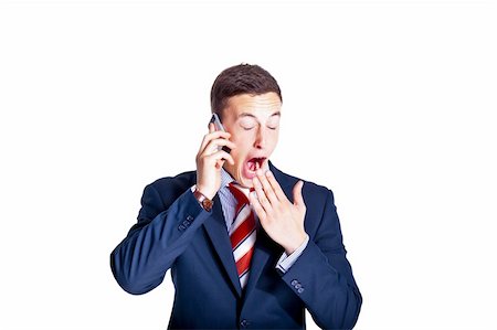 rusloc (artist) - Manager yawning while talking on the phone Foto de stock - Super Valor sin royalties y Suscripción, Código: 400-05367226