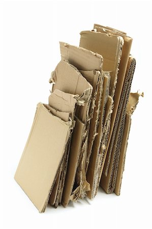 simsearch:400-04775658,k - Stack of Cardboard Pieces on White Background Photographie de stock - Aubaine LD & Abonnement, Code: 400-05367624
