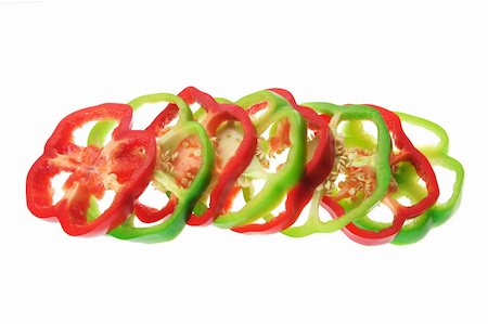 Slices of Capsicums on White Background Foto de stock - Super Valor sin royalties y Suscripción, Código: 400-05367665