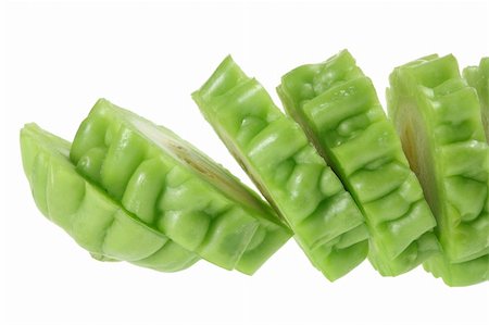 Slices of Bitter Gourd on White Background Photographie de stock - Aubaine LD & Abonnement, Code: 400-05367703