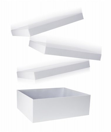simsearch:400-04775658,k - Cardboard Box with Flying Lid on White Background Photographie de stock - Aubaine LD & Abonnement, Code: 400-05368520