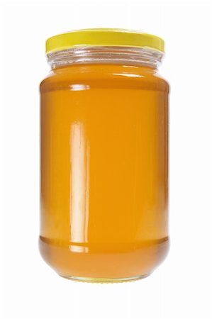 Bottle of Honey on White Background Stock Photo - Budget Royalty-Free & Subscription, Code: 400-05368552