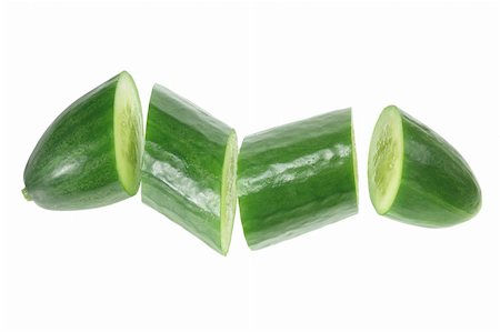 simsearch:400-05369444,k - Slices of Lebanese Cucumber on White Background Stock Photo - Budget Royalty-Free & Subscription, Code: 400-05369252