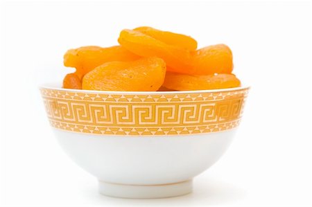 simsearch:400-04823249,k - dried apricots in cup isolated on white Stock Photo - Budget Royalty-Free & Subscription, Code: 400-05369268