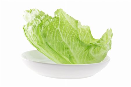 simsearch:400-05369257,k - Iceberg Lettuce on Plate with White Background Photographie de stock - Aubaine LD & Abonnement, Code: 400-05369428