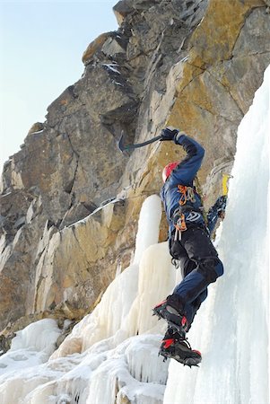 picture of switzerland with snowfall and frost - Young man, ice climbing an attractive route. Stock Photo - Budget Royalty-Free & Subscription, Code: 400-05360050