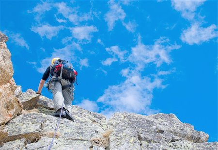 Extreme sport. The rock-climber during rock conquest Foto de stock - Royalty-Free Super Valor e Assinatura, Número: 400-05360052