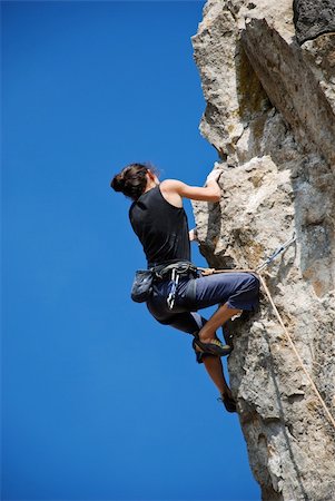 Extreme sport. The rock-climber during rock conquest Foto de stock - Royalty-Free Super Valor e Assinatura, Número: 400-05360122