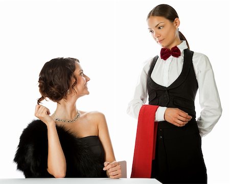 beautiful elegant woman making order to a waitress, isolated on white Stock Photo - Budget Royalty-Free & Subscription, Code: 400-05360364