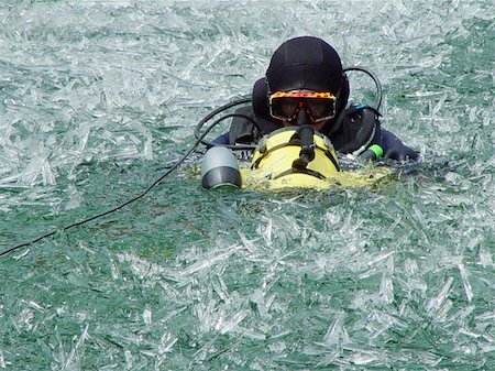 simsearch:400-04007432,k - A diver diving in the icy lake Stock Photo - Budget Royalty-Free & Subscription, Code: 400-05360816