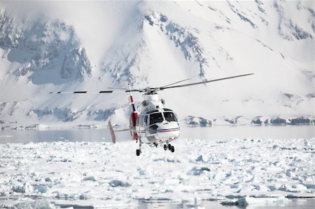 simsearch:400-05361285,k - Helicopter rescue action over the Arctic fjord Photographie de stock - Aubaine LD & Abonnement, Code: 400-05361221