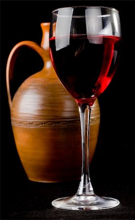 simsearch:400-03968646,k - Pitcher and a glass of red liquid on a black background Stock Photo - Budget Royalty-Free & Subscription, Code: 400-05361744