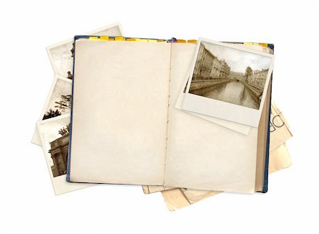 Old book and photos. Objects isolated over white Stock Photo - Budget Royalty-Free & Subscription, Code: 400-05362742