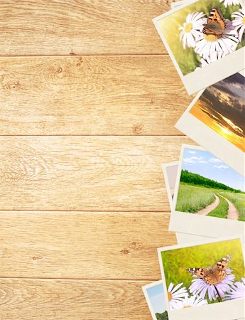Frame with old photos. Objects over wooden planks Stock Photo - Budget Royalty-Free & Subscription, Code: 400-05362752