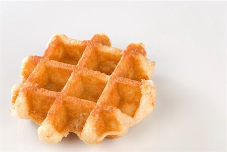 pancake bake - Freshly baked Belgian waffle isolated on white Stock Photo - Budget Royalty-Free & Subscription, Code: 400-05363930