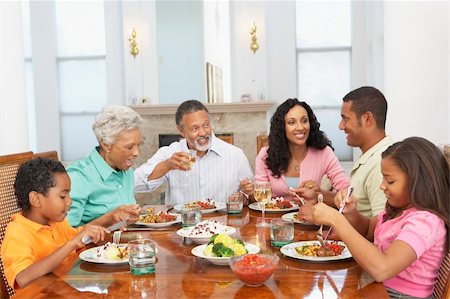 simsearch:400-06098367,k - Family Having A Meal Together At Home Stock Photo - Budget Royalty-Free & Subscription, Code: 400-05374172