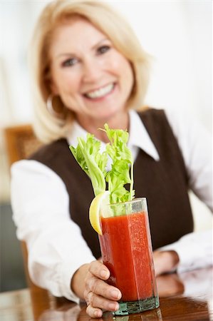 simsearch:400-05364195,k - Woman Drinking A Bloody Mary Stock Photo - Budget Royalty-Free & Subscription, Code: 400-05374200
