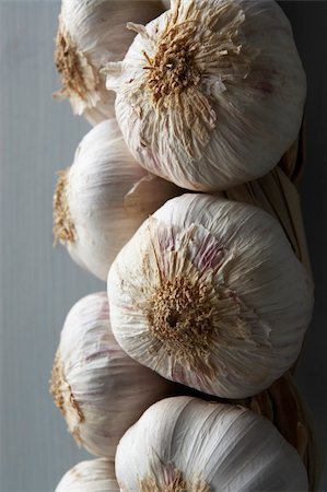 Garlic Cloves Hanging From String Stock Photo - Budget Royalty-Free & Subscription, Code: 400-05374380