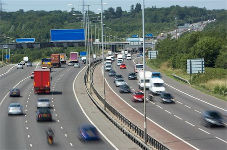 Blurred Traffic On A Busy Highway Stock Photo - Budget Royalty-Free & Subscription, Code: 400-05375183