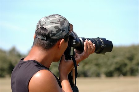 simsearch:400-04880707,k - Photographer is taken pictures on a hot summer day. Stock Photo - Budget Royalty-Free & Subscription, Code: 400-05375802
