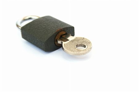 simsearch:400-03909011,k - Closed lock and key isolated on white background. Stock Photo - Budget Royalty-Free & Subscription, Code: 400-05376862