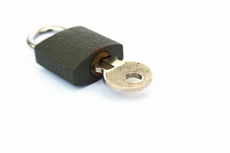 simsearch:400-07338365,k - Closed lock and key isolated on white background. Fotografie stock - Microstock e Abbonamento, Codice: 400-05376862