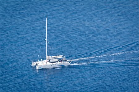 sailboat racing - An image of a nice boat in the blue ocean Stock Photo - Budget Royalty-Free & Subscription, Code: 400-05377000