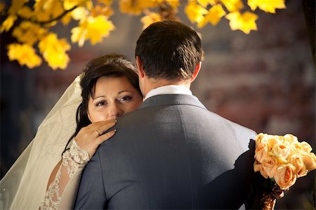 Newlyweds posing in autumn park Stock Photo - Budget Royalty-Free & Subscription, Code: 400-05377179