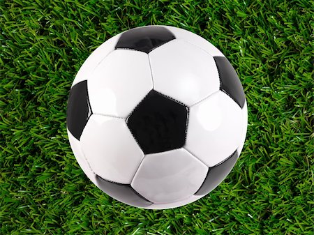 simsearch:400-08372849,k - Black and white soccer balls isolated on artificial grass Stock Photo - Budget Royalty-Free & Subscription, Code: 400-05379128