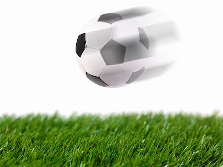 simsearch:400-08372849,k - Black and white soccer balls isolated on artificial grass Stock Photo - Budget Royalty-Free & Subscription, Code: 400-05379123