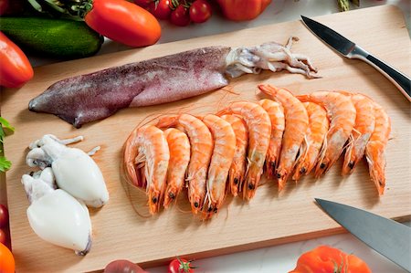 raw squid - still life of raw seafood and vegetables Stock Photo - Budget Royalty-Free & Subscription, Code: 400-05379708