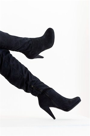 simsearch:400-07099649,k - detail of sitting woman wearing fashionable black boots Foto de stock - Super Valor sin royalties y Suscripción, Código: 400-05379909