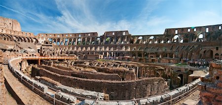 simsearch:400-04973124,k - Wide panorama of the Colosseum (Coliseum) in Rome Fotografie stock - Microstock e Abbonamento, Codice: 400-05370011